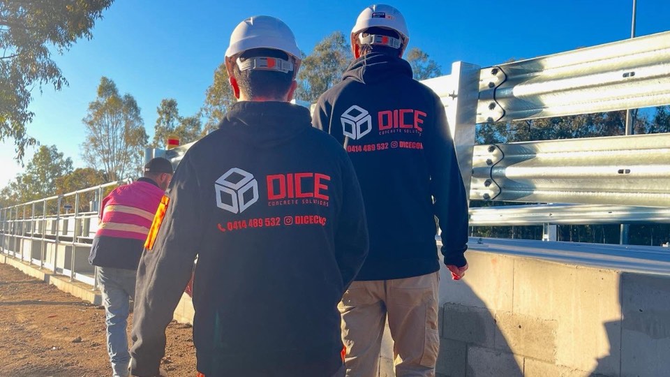 Finished concrete barrier and structure on a Dice Concrete Solutions site.